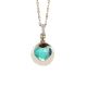 Necklace color gold with retractable heart and crystal clear green