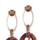 Earrings with oval of zircons and Swarovski red magma
