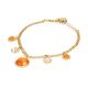 
Double strand bracelet with orange and beige pendant cabochons with zircons