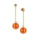 
Earrings with cubic zirconia pendant and flecked orange cabochon