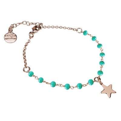 
Rosé bracelet with green crystals and star