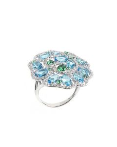 Ring with floral decoration and zircons