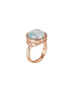 
Ring with light blue cabochon flecked crystal and zircons