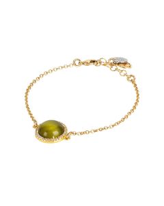 
Bracelet with green olivine cabochon, flecked and cubic zirconia