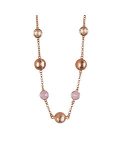 
Necklace with peach crystals and rose-colored quartz milk and scratched elements